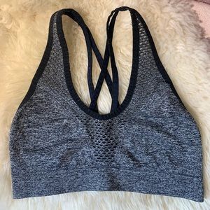 Sports bra grey with mesh design.